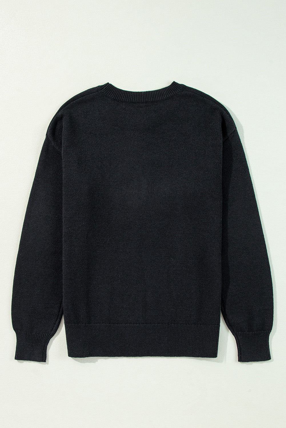 Schwarzer boo strickpullover mit geripptem rand und schultern