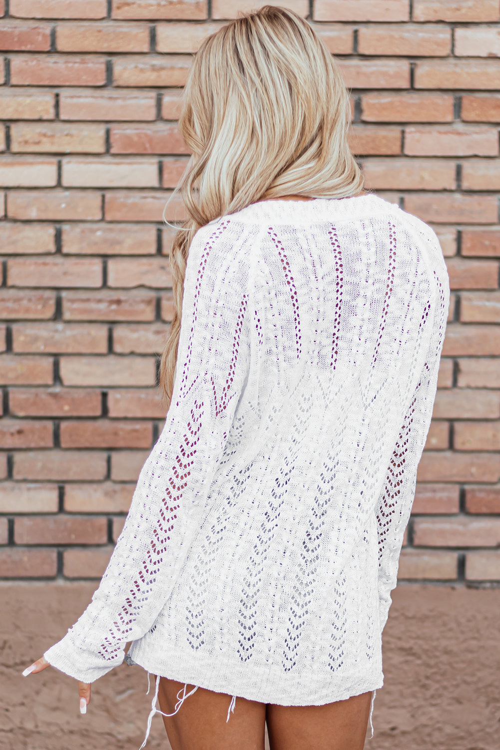 Weiße solide strickjacke mit offenem schnitt