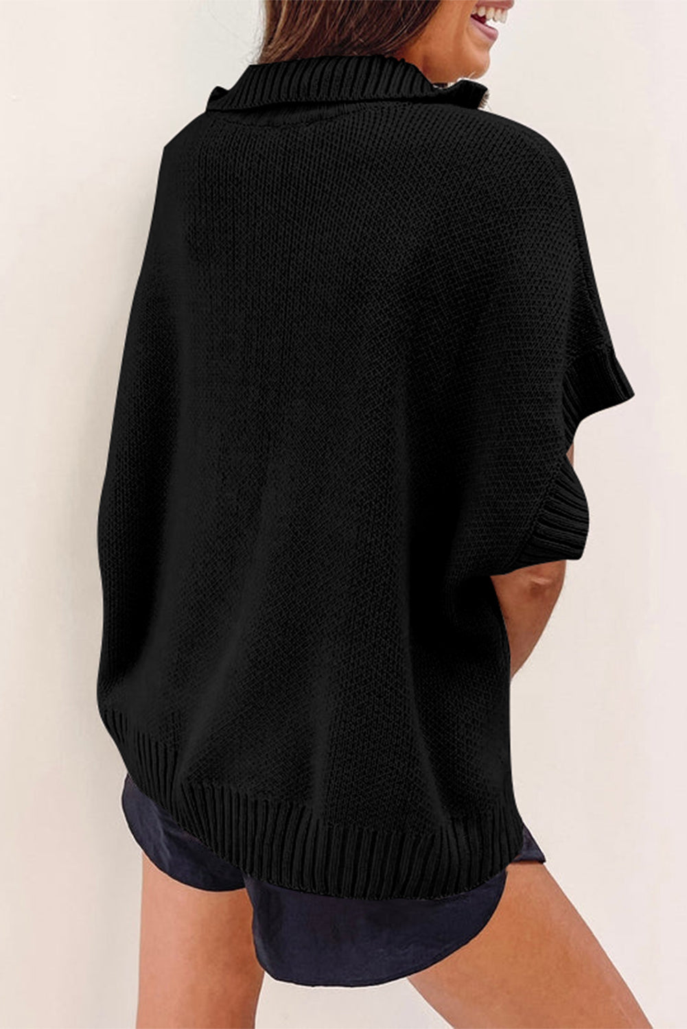 Schwarzer quarter zip pullover mit kurzen fledermausärmeln