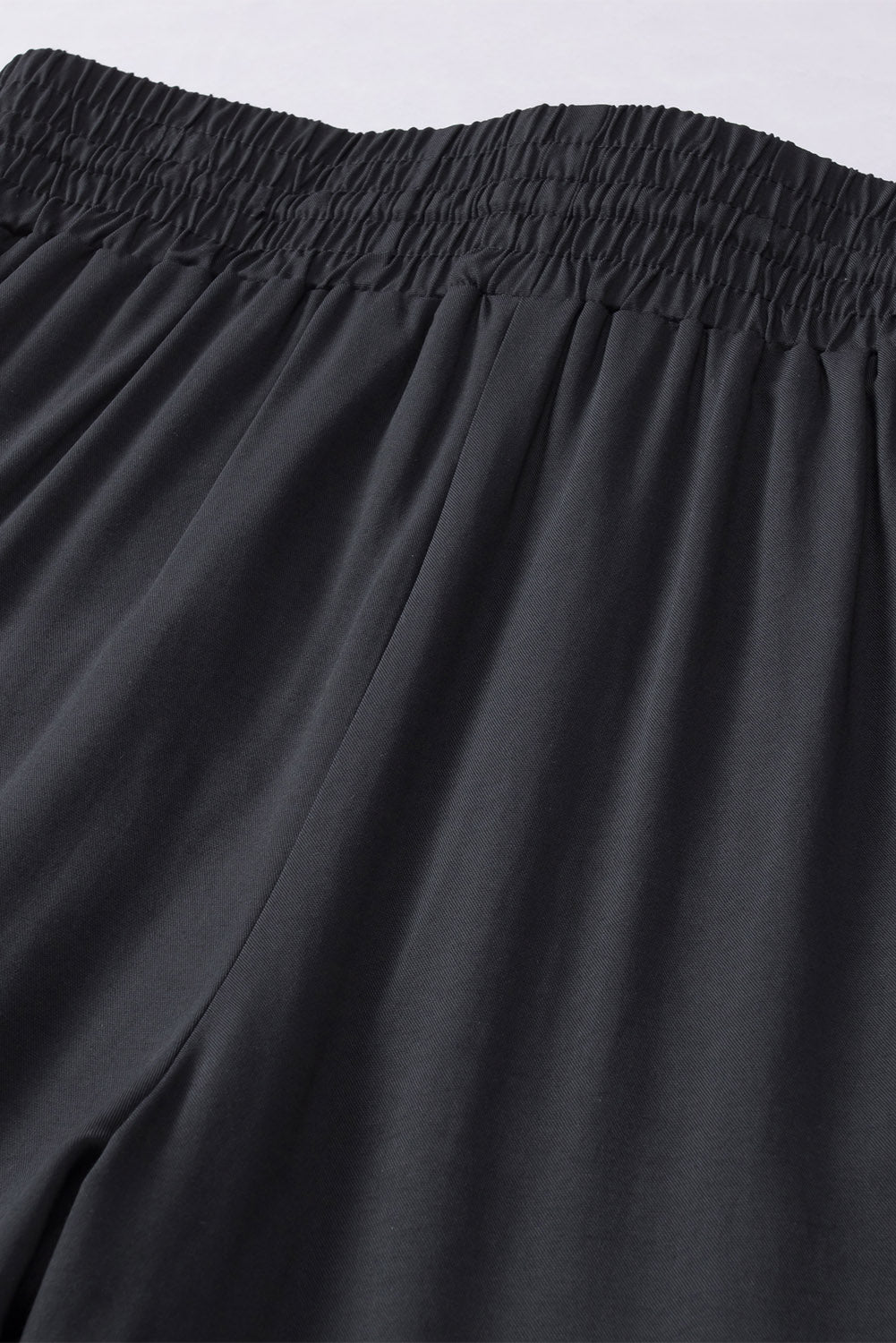 Schwarzer kordelzug elastische taille lässige hose mit weitem bein