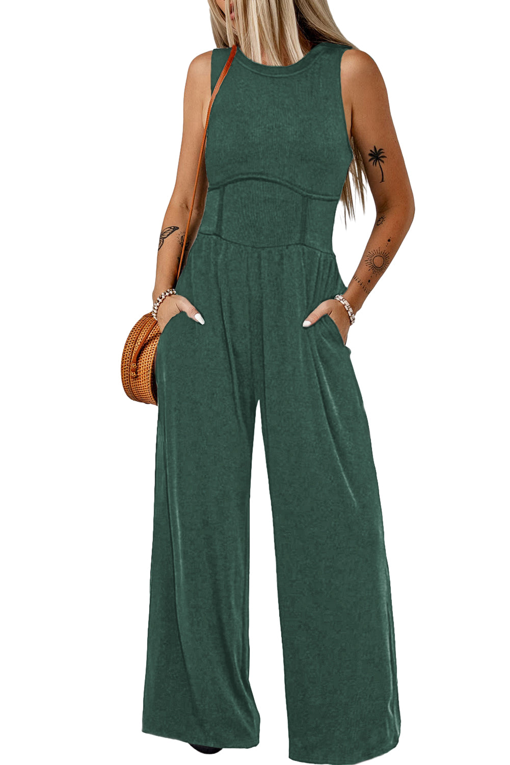 Schwarzgrüner ärmelloser jumpsuit mit weitem bein und geschnürter taille