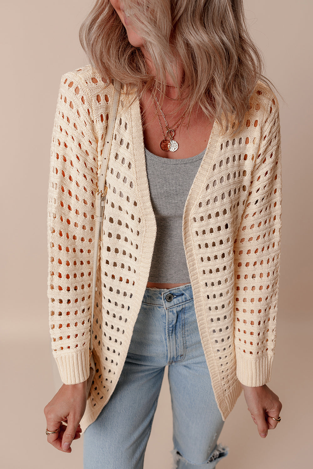Aprikosenfarbener, offen gestrickter duster cardigan