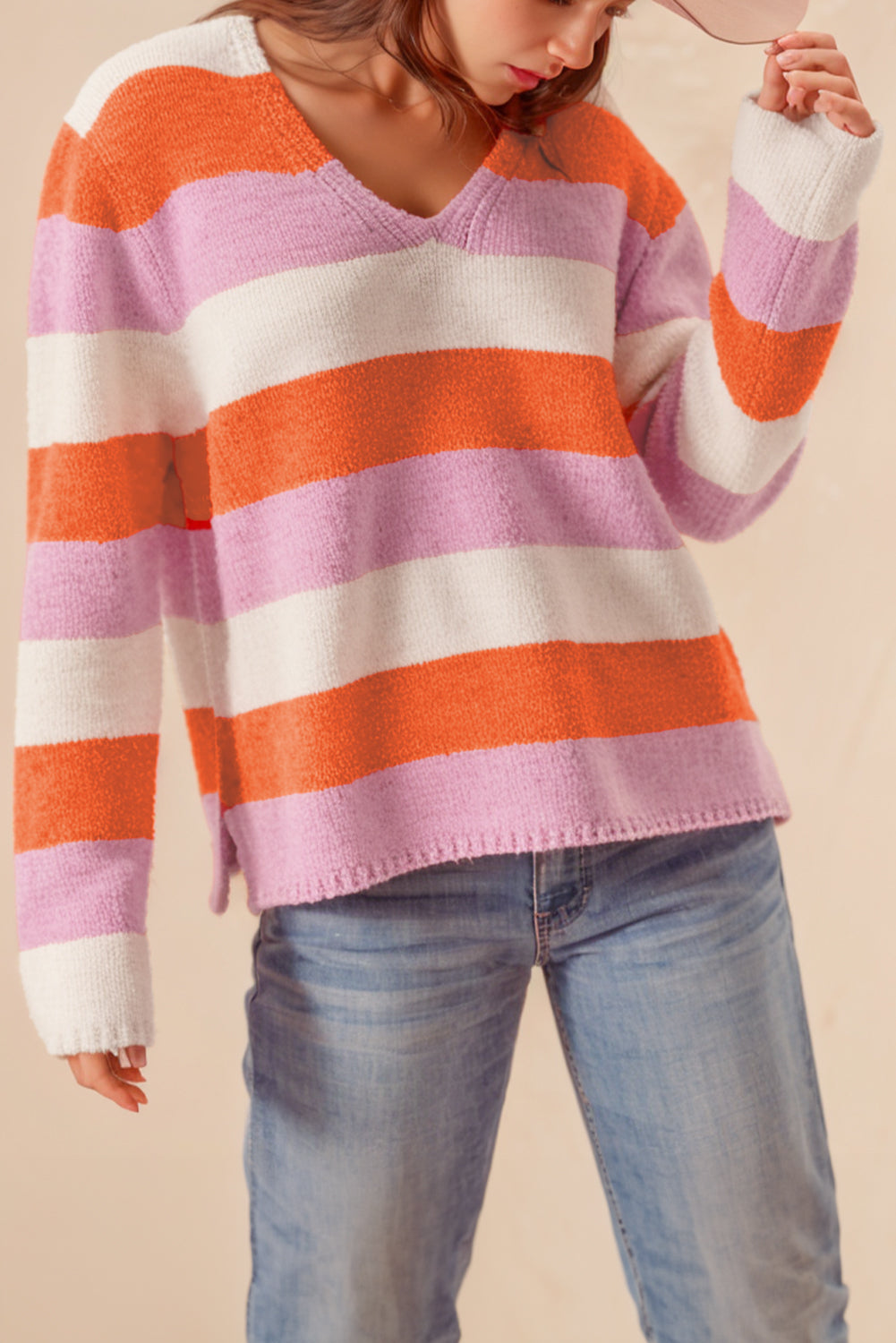 Orange gestreifter colorblock v-ausschnitt freizeitpullover