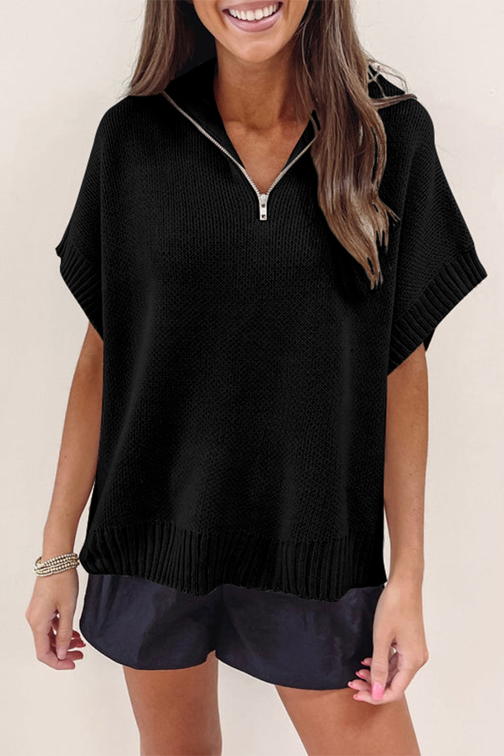 Schwarzer quarter zip pullover mit kurzen fledermausärmeln