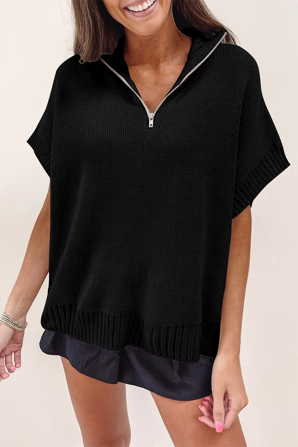 Schwarzer quarter zip pullover mit kurzen fledermausärmeln