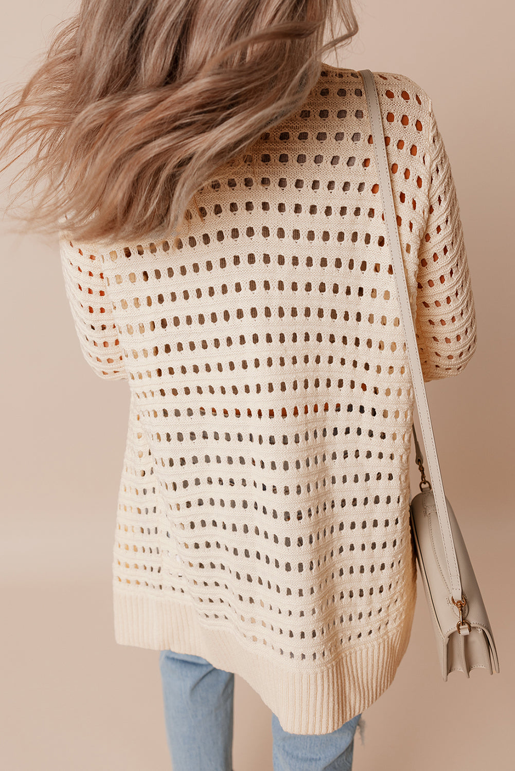 Aprikosenfarbener, offen gestrickter duster cardigan