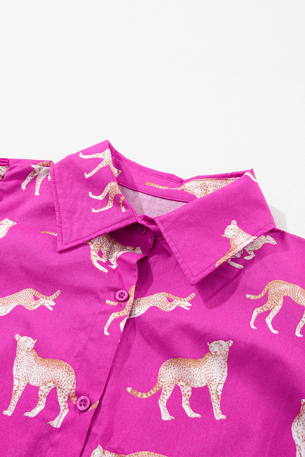 Rosa geparden-print tunika-shirt mit kordelzug