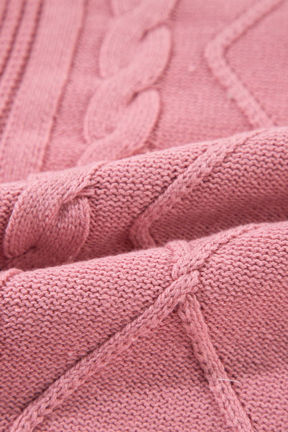 Rosa kabelstrickpullover mit gemischter struktur und kurzen ärmeln