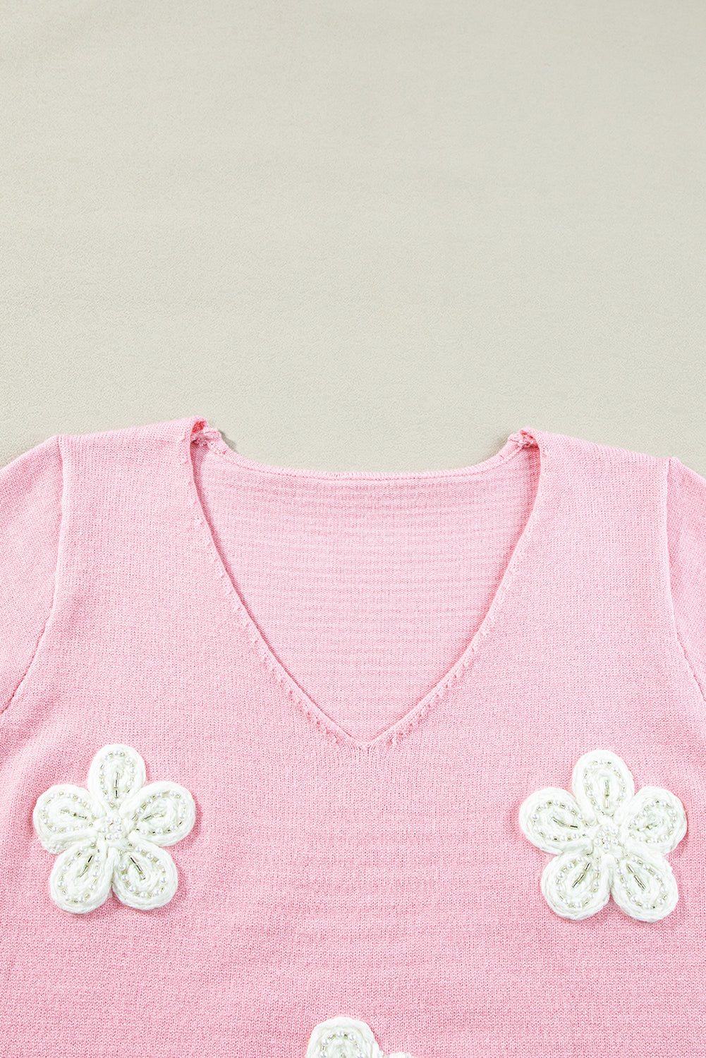 Rosa blume gehäkelt v-ausschnitt kurzarm pullover