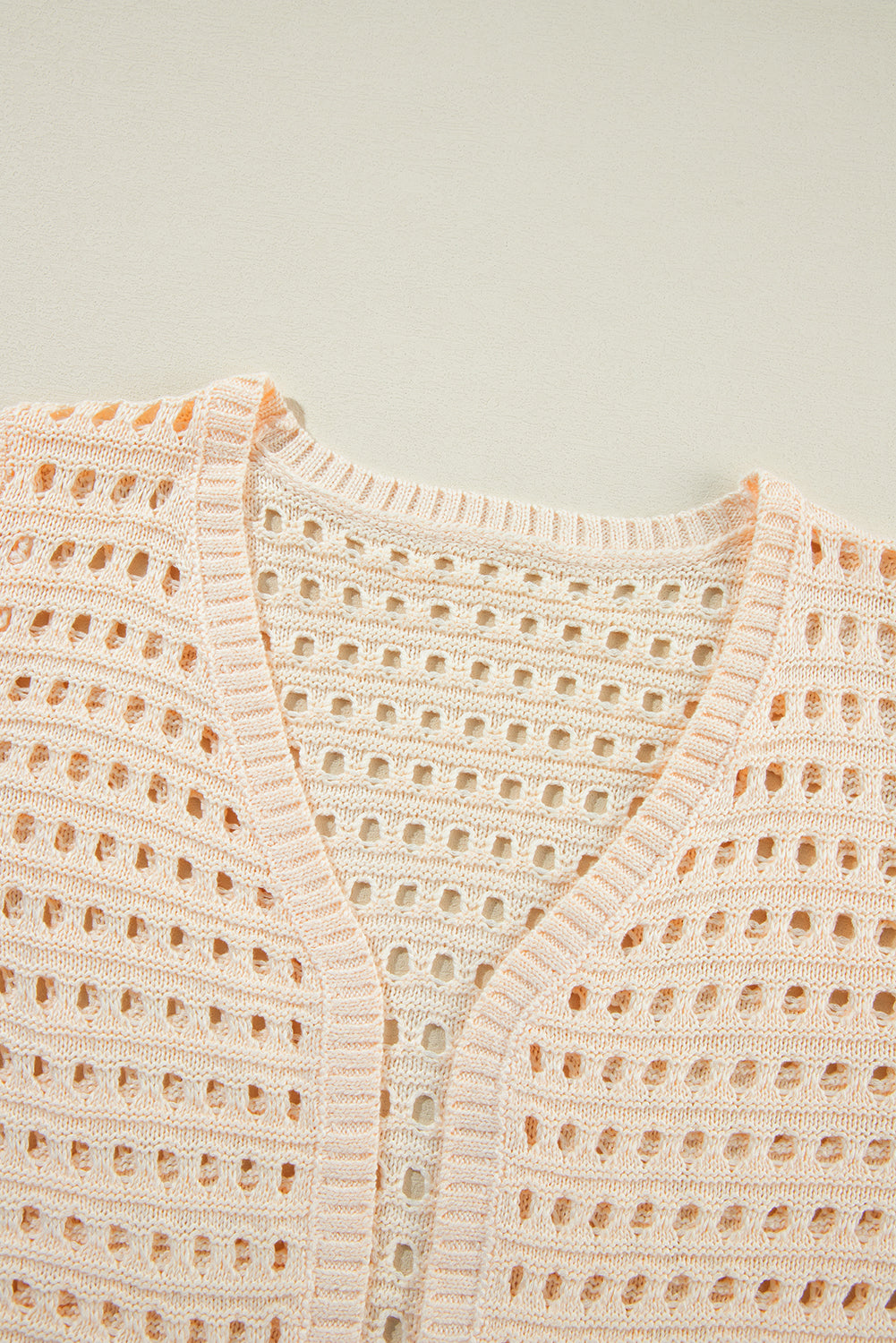 Aprikosenfarbener, offen gestrickter duster cardigan