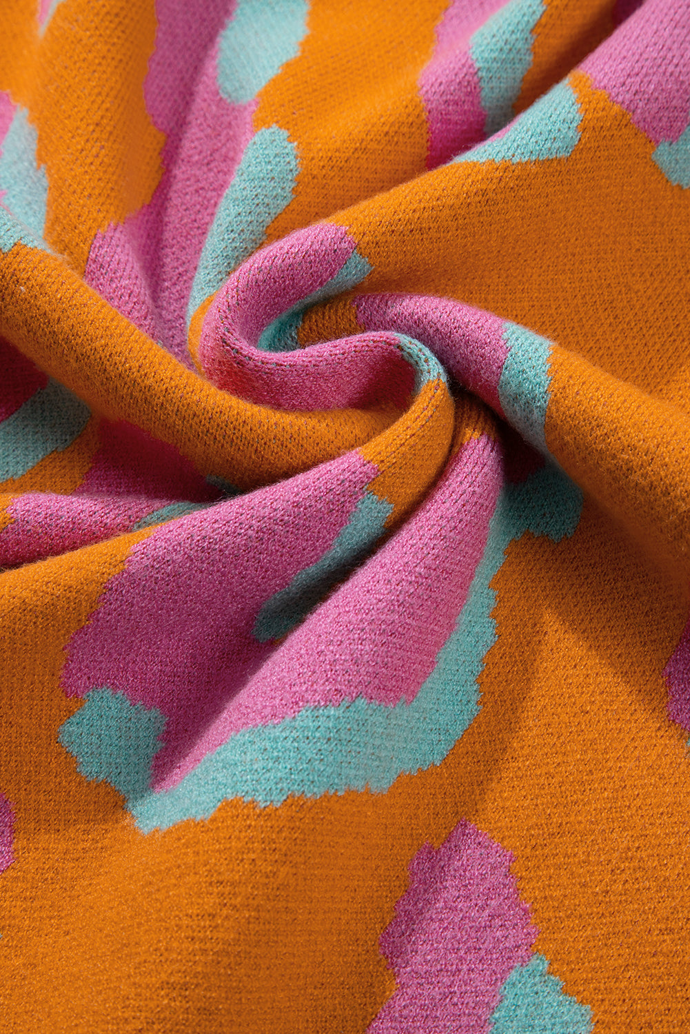 Orange leopard colorblock pullover mit geripptem rand