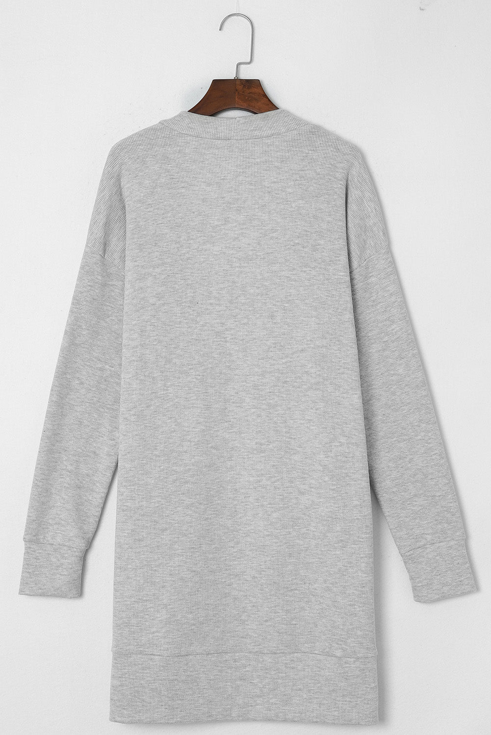 Hellgraue thermo-waffelstrick-strickjacke mit taschen