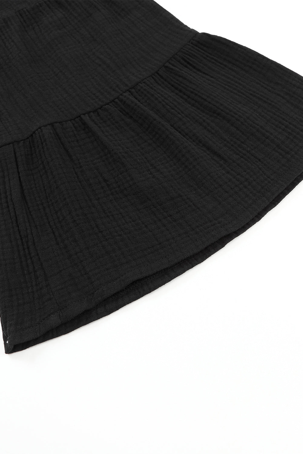 Schwarze strukturierte hose mit hoher taille und gerafftem glockenboden
