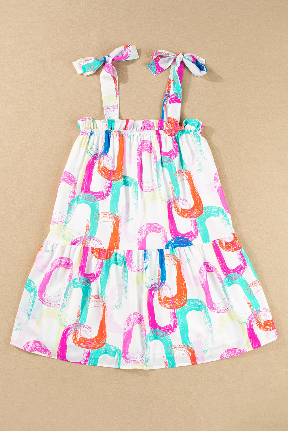 Weißes minikleid mit abstraktem druck und geknoteten trägern mit rüschen