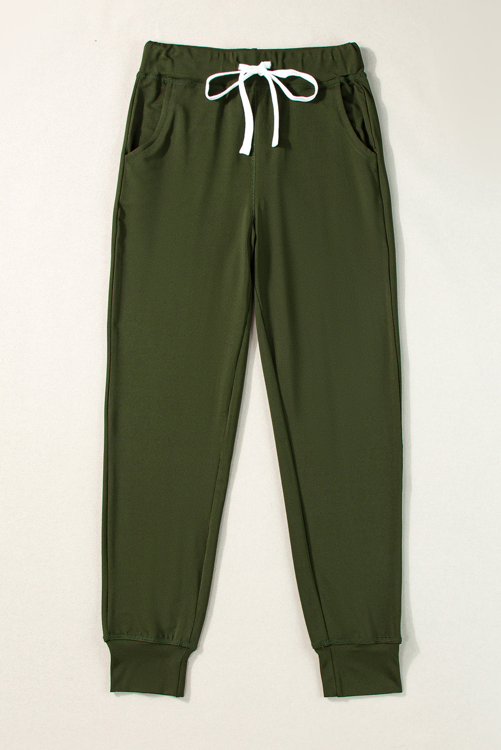 Moosgrüne jogginghose mit kordelzug an der taille