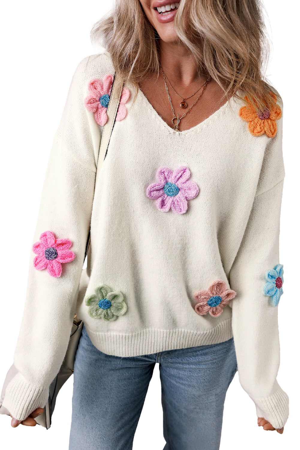 Weißer gehäkelter blumen-v-ausschnitt-pullover