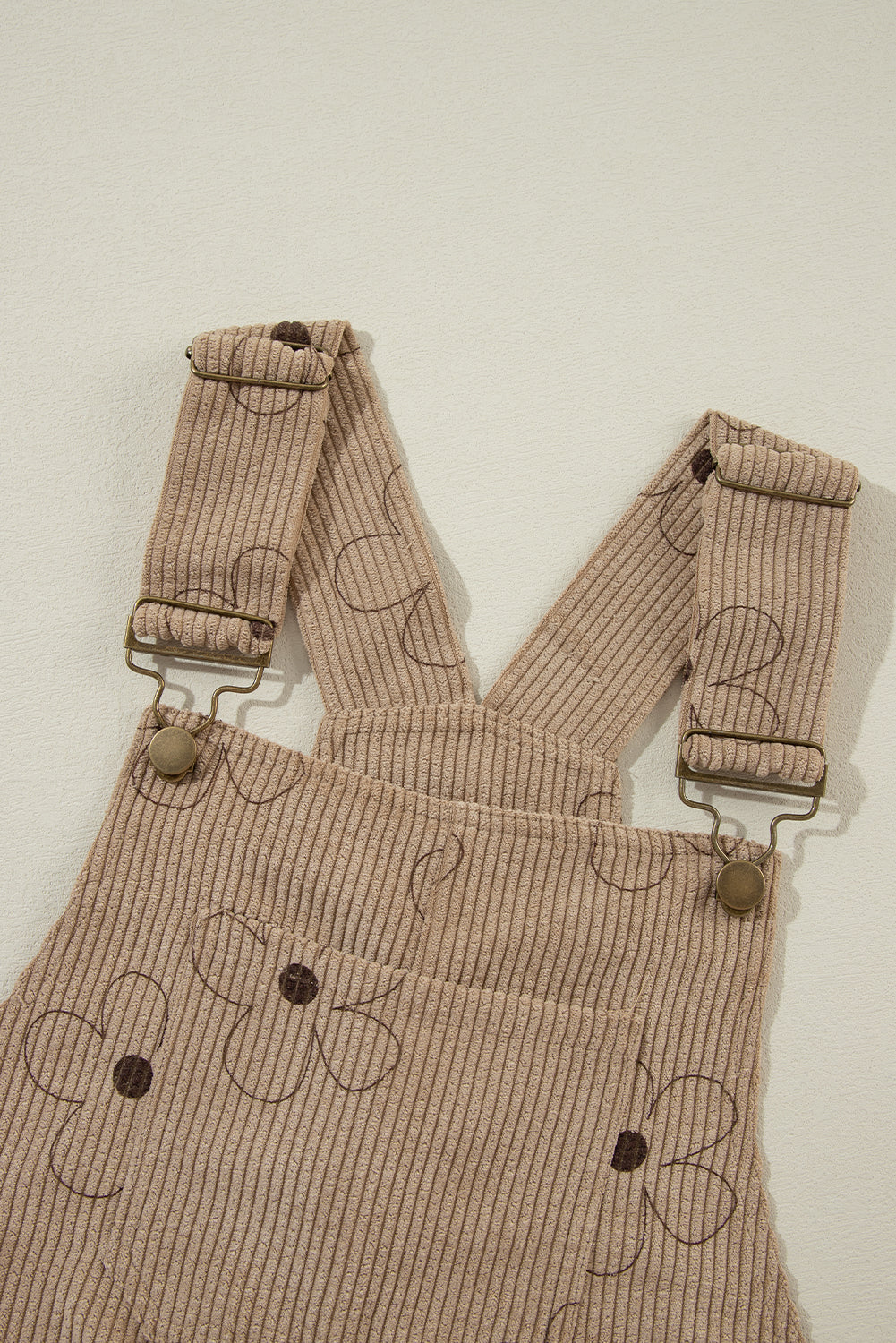 Khakifarbener kord-overall mit blumendruck