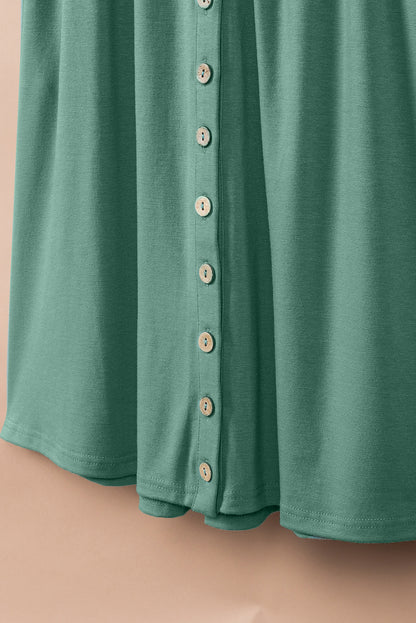 Grünes ärmelloses minikleid mit hoher taille und knöpfen