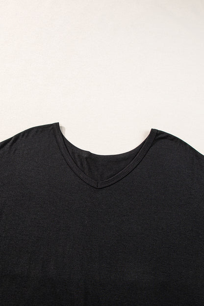 Schwarzer v-ausschnitt mit versteckten taschenschlitzen maxi-t-shirt-kleid