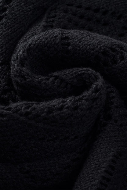 Schwarze durchbrochene strickjacke mit lochmuster