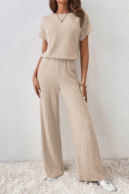 Pergamentfarbener gerippter kurzarm-overall mit weitem bein