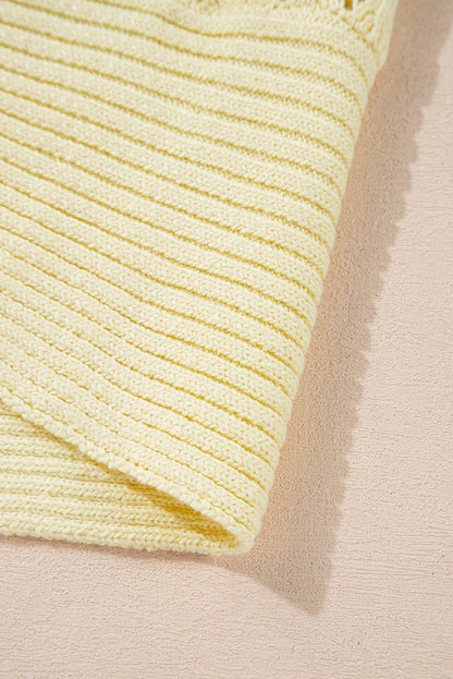 Gelbe creme pointelle-strickjacke mit offener vorderseite