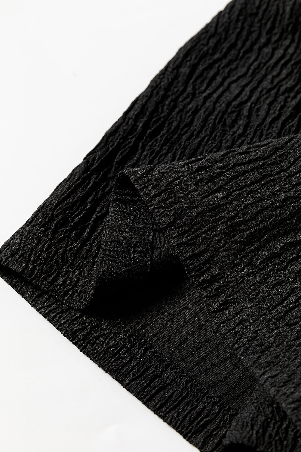 Schwarze strukturierte hose mit lockerem kordelzug