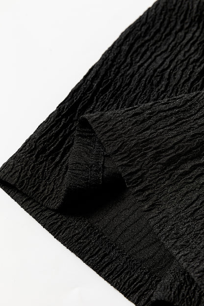 Schwarze strukturierte hose mit lockerem kordelzug