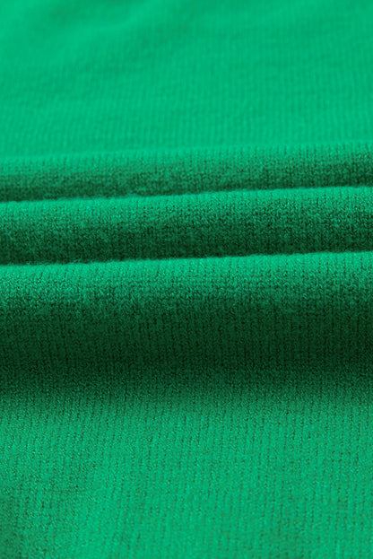 Leuchtend grüner, geblümter kurzarmpullover mit blasen