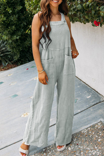Grauer strukturierter overall mit weitem bein und taschen