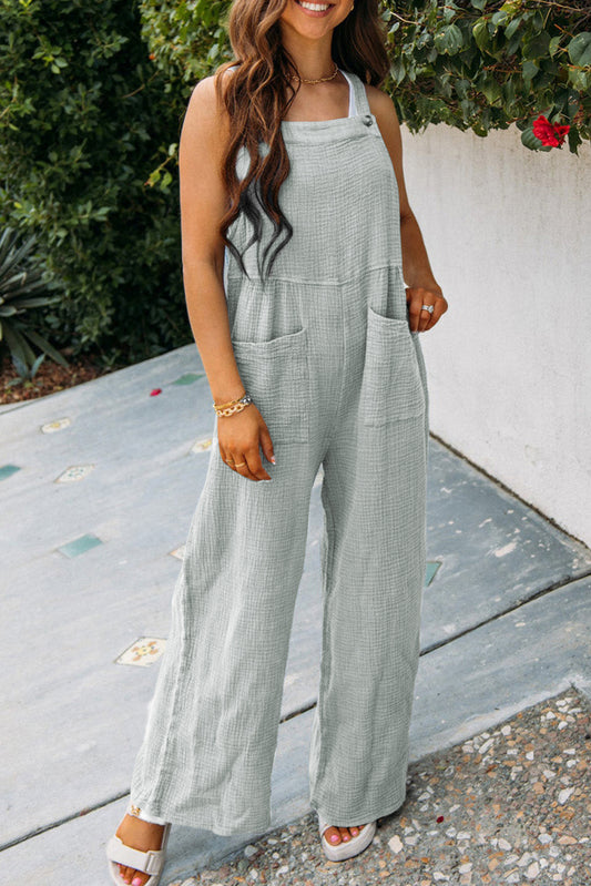 Grauer strukturierter overall mit weitem bein und taschen