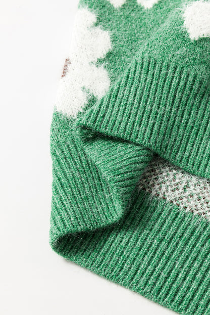Grüner pullover mit floralem muster und halbem reißverschluss an der schulter