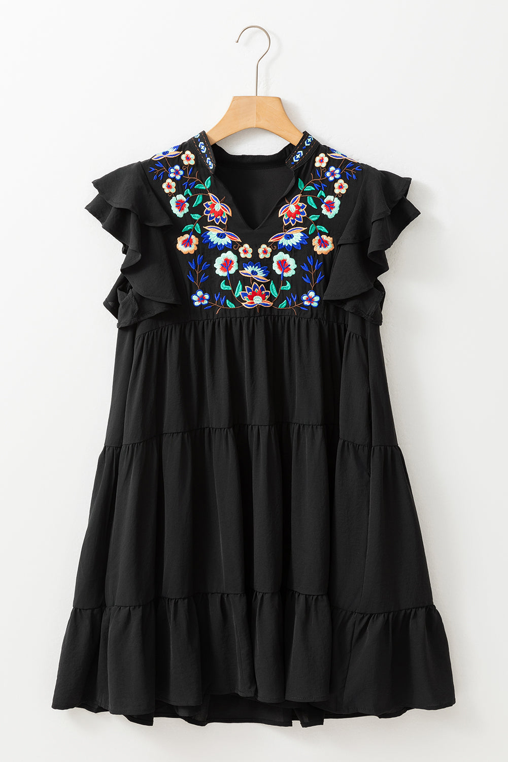Schwarzes, mit blumen besticktes, gerafftes minikleid