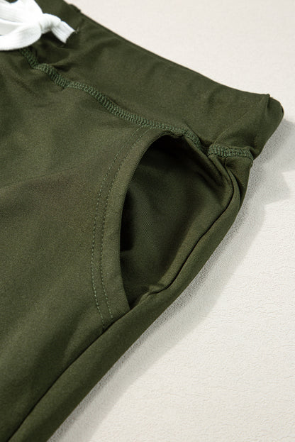 Moosgrüne jogginghose mit kordelzug an der taille