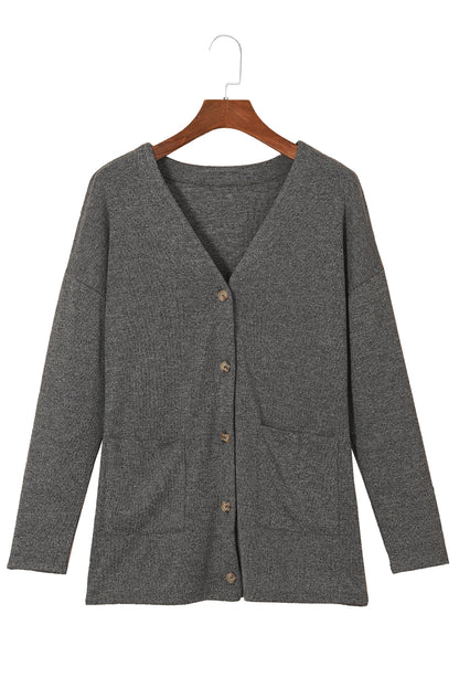 Strickjacke mit taschen und knopfleiste in grauem heidekraut