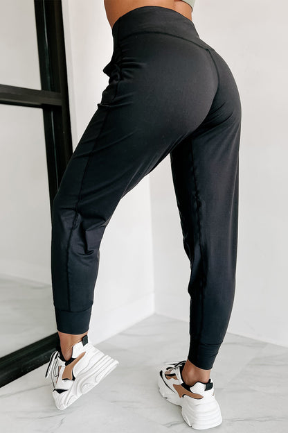 Schwarze jogginghose mit hoher taille und offener naht