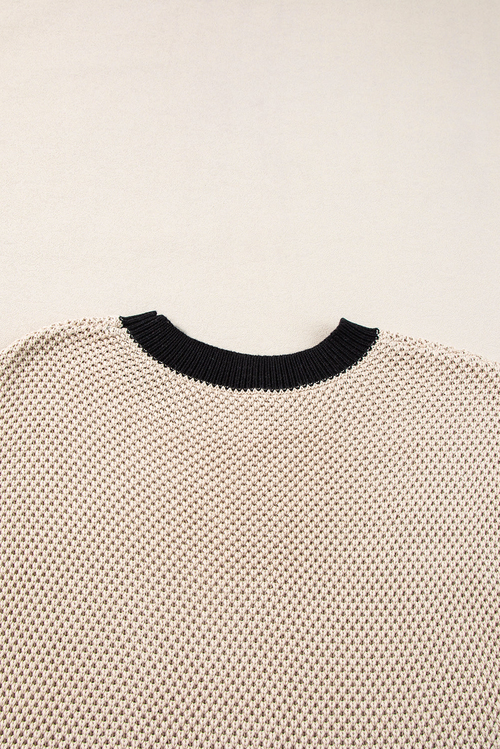 Helles french beige kontrastbesatz rundhalsausschnitt pullover top mit fledermausärmeln