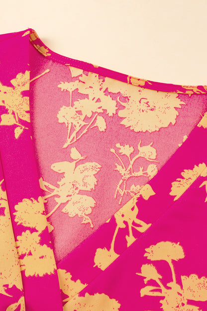 Rosafarbenes Kleid mit Fledermausärmeln und Blumendruck