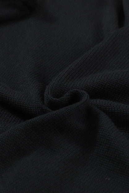 Schwarzer pullover mit hohler spitze und v-ausschnitt