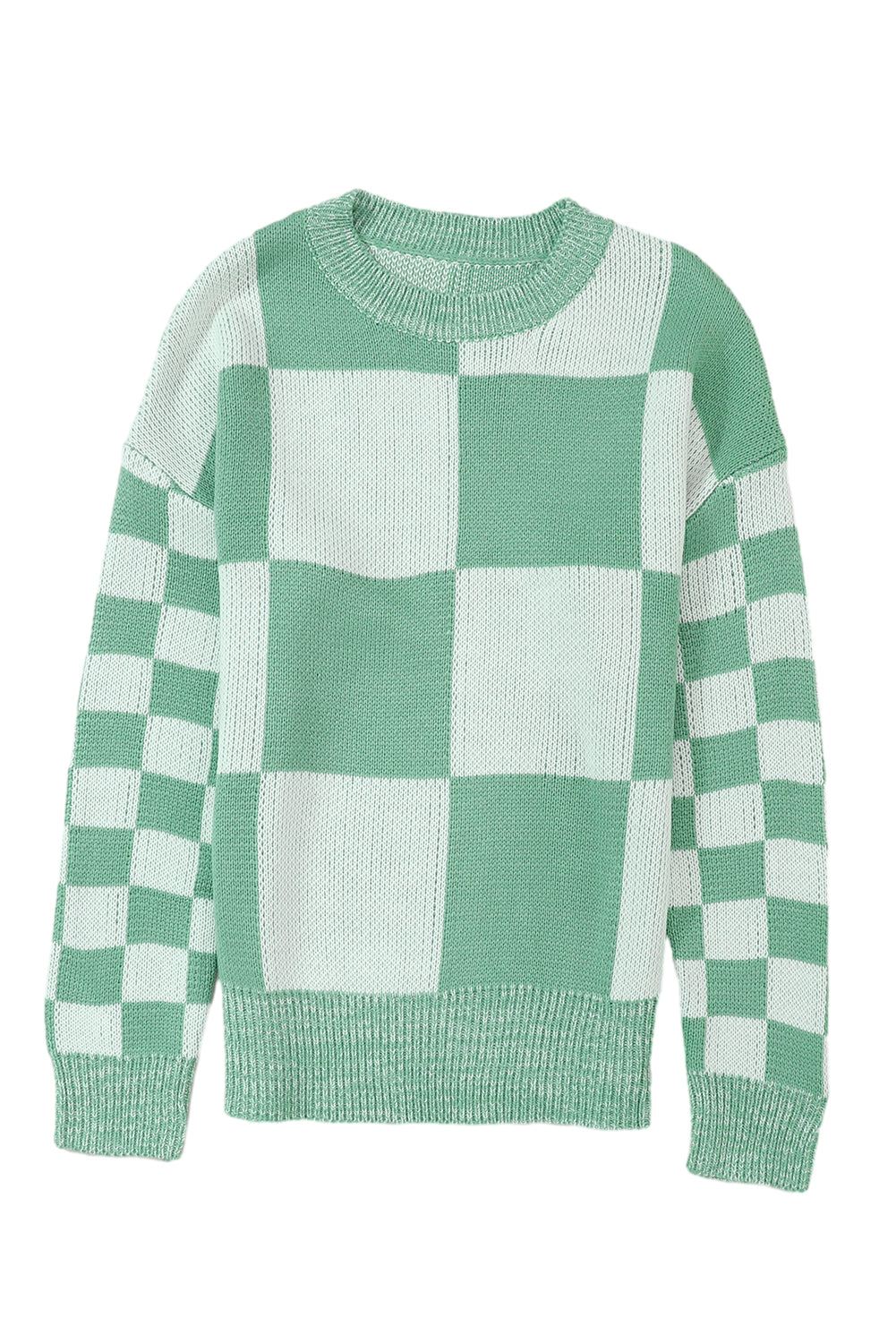 Mintgrüner pullover mit karomuster und schultertaschen
