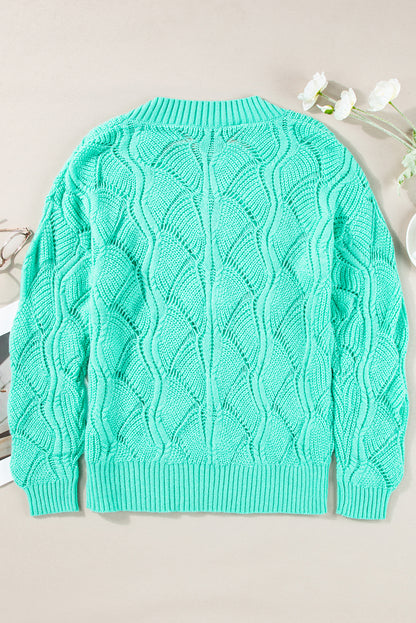 Mintgrüner strickpullover mit hohlem v-ausschnitt und tropfenschulter
