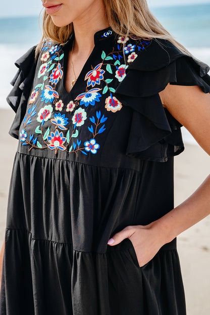 Schwarzes, mit blumen besticktes, gerafftes minikleid