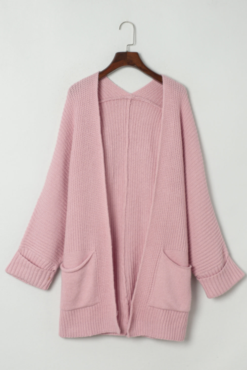 Rosa übergroßer pullover mit umgeschlagenen ärmeln cardigan