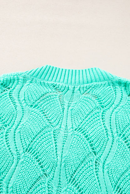 Mintgrüner strickpullover mit hohlem v-ausschnitt und tropfenschulter