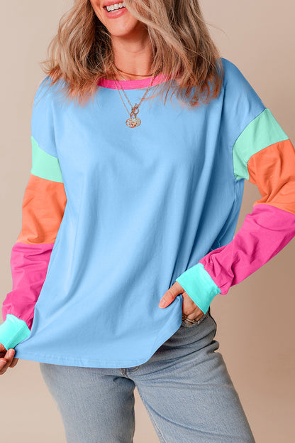 Dunkelblaues colorblock patchwork-langarm-top mit lockeren ärmeln