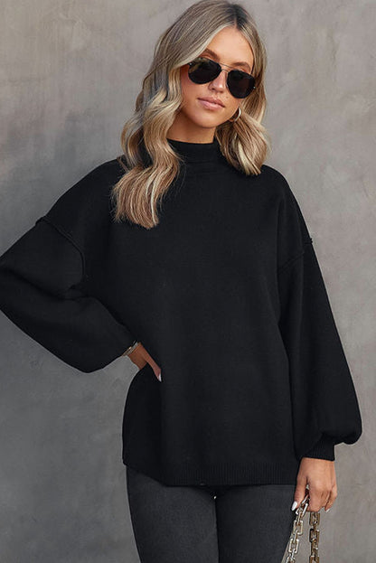 Schwarzer rollkragenpullover mit hängenden schultern und bubble sleeve strickpullover