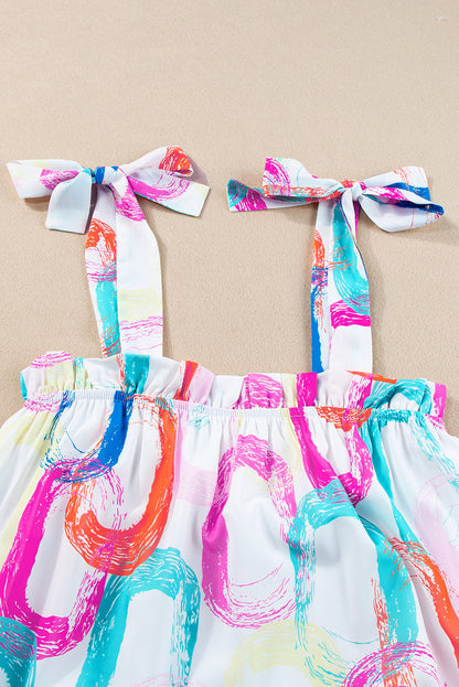 Weißes minikleid mit abstraktem druck und geknoteten trägern mit rüschen