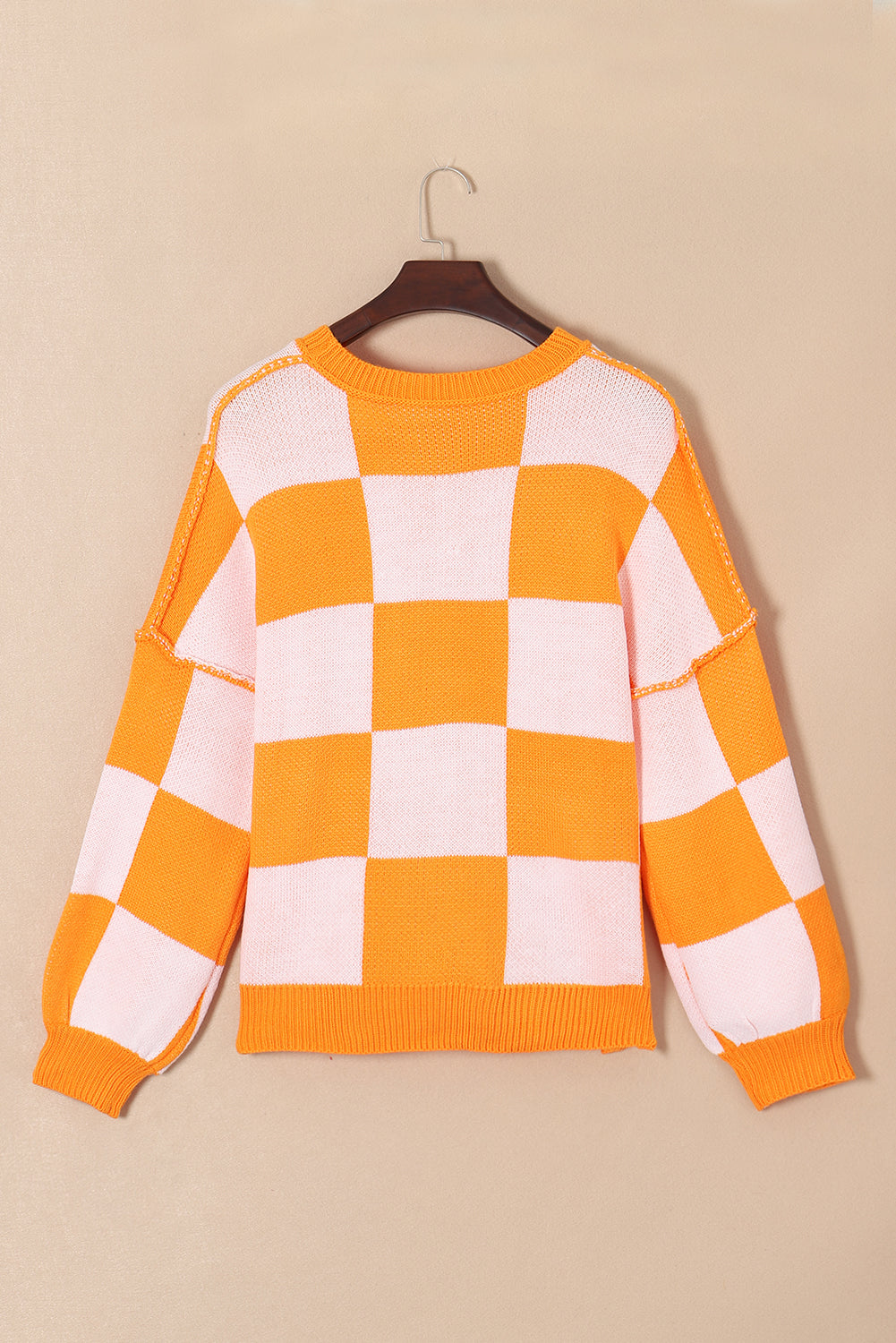 Orange karierter pullover mit läuferärmeln
