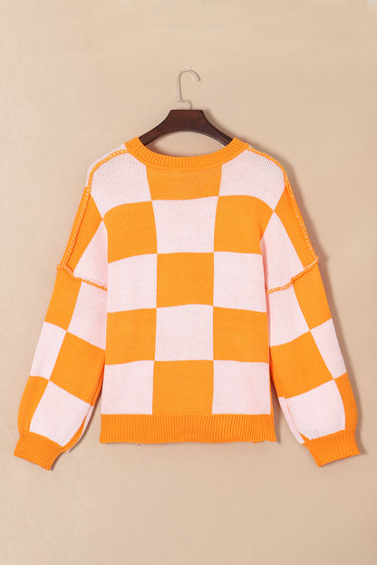 Orange karierter pullover mit läuferärmeln