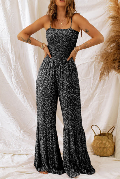 Schwarzer schmaler riemen gesmokter mieder weites bein floraler jumpsuit